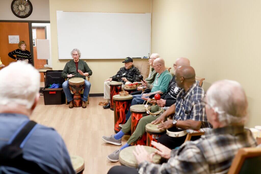 group playing in a drum circle