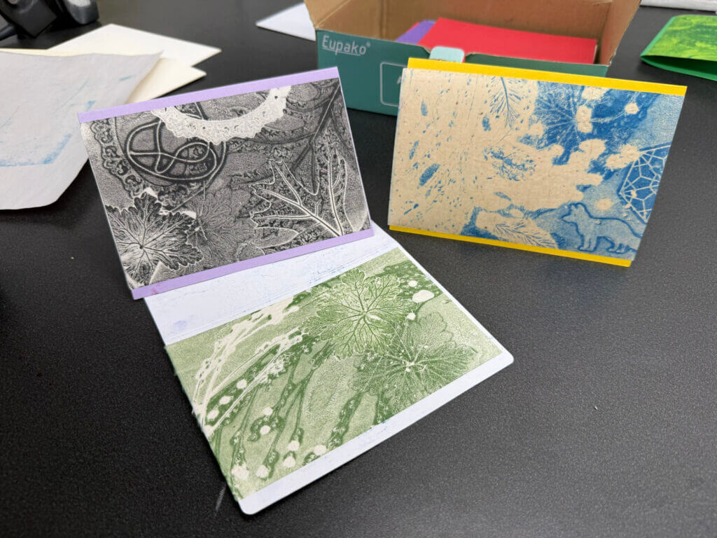 Example of monoprint showing single color image with imprints of objects. 