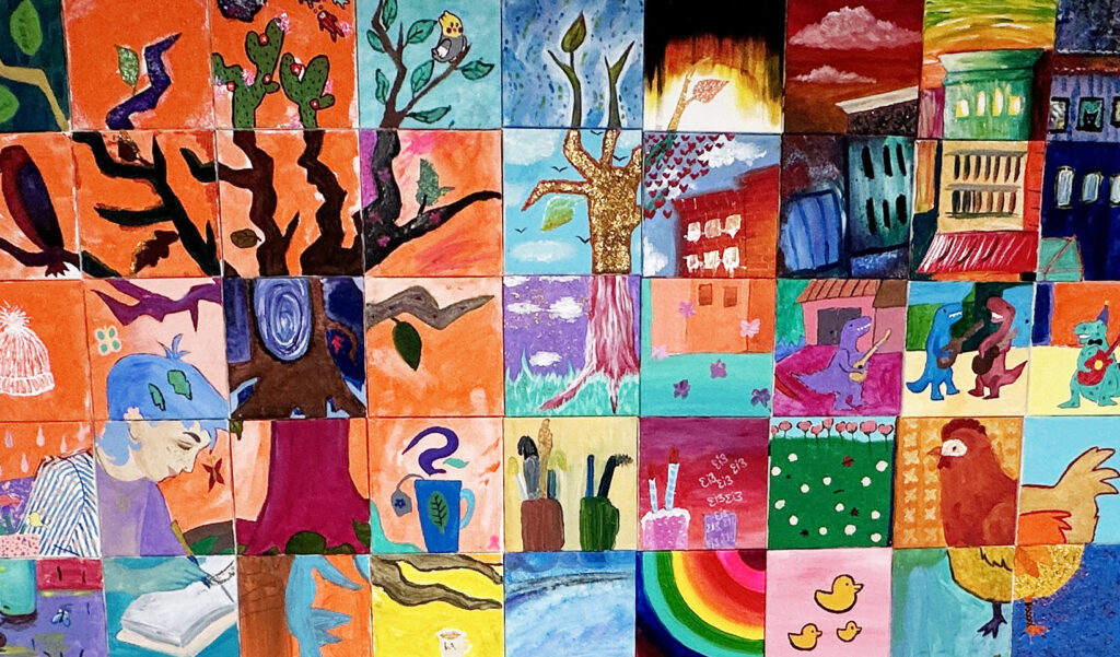 Multiple square mini-artworks creating a bigger image of a town, with trees and animals. 