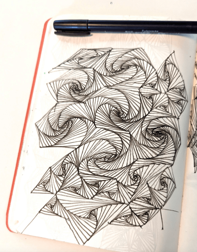 A notebook with intricate lines. 