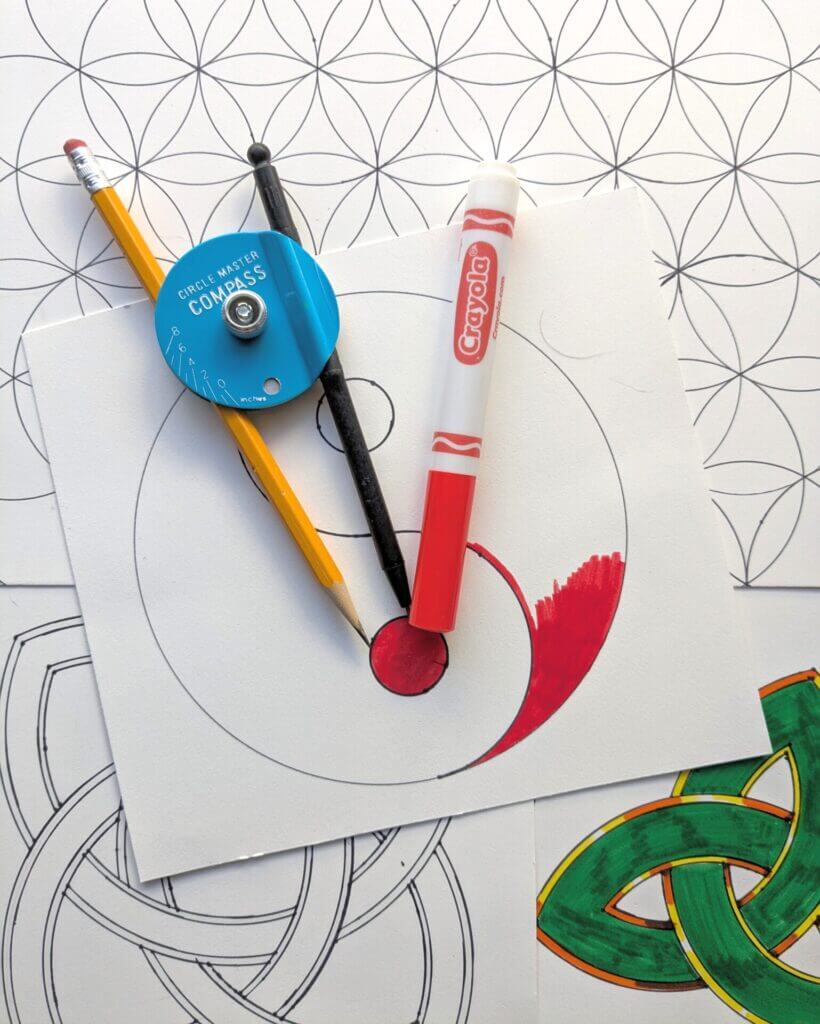 A geometric background with a compass and pens in the foreground. 
