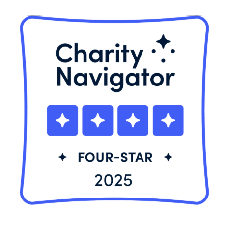 Charity Navigator Four-Star rating badge for 2025, featuring four blue star icons and the Charity Navigator logo inside a rounded blue border.