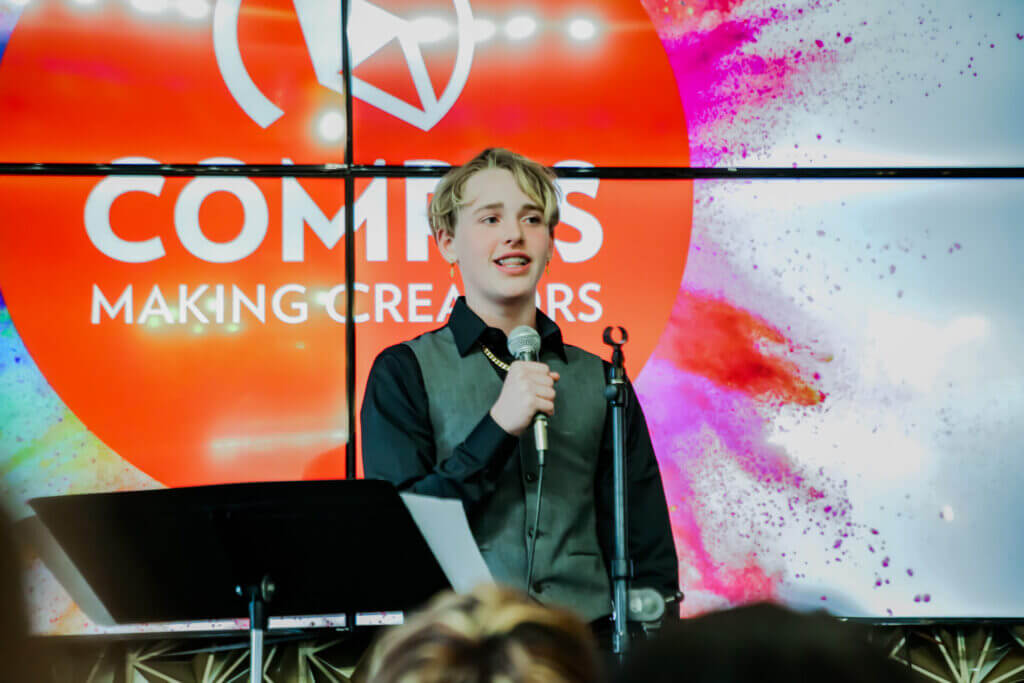 Andre performing at the 2026 Youth Spoken Word Showcase.