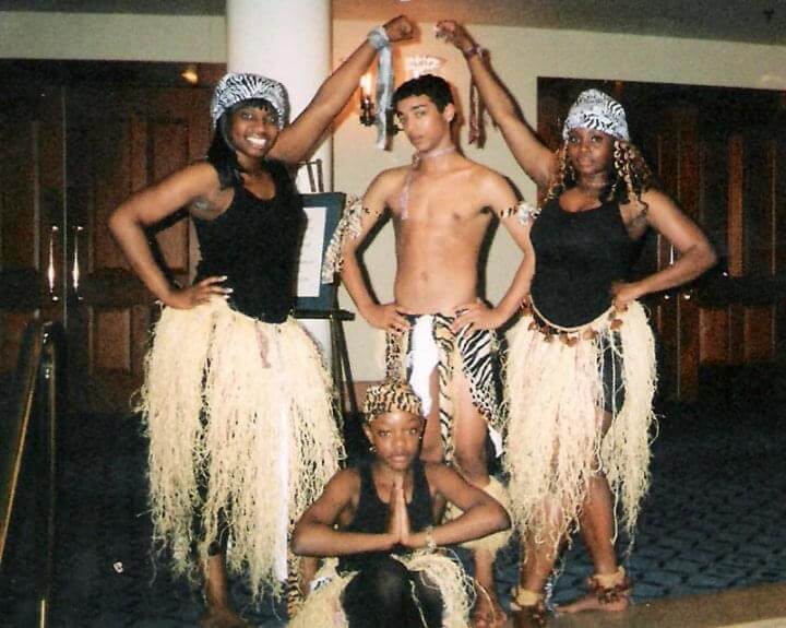 Students in dance costumes.